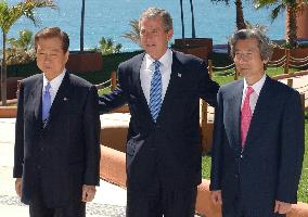 Koizumi, Bush, Kim urge N. Korea to scrap nuke program